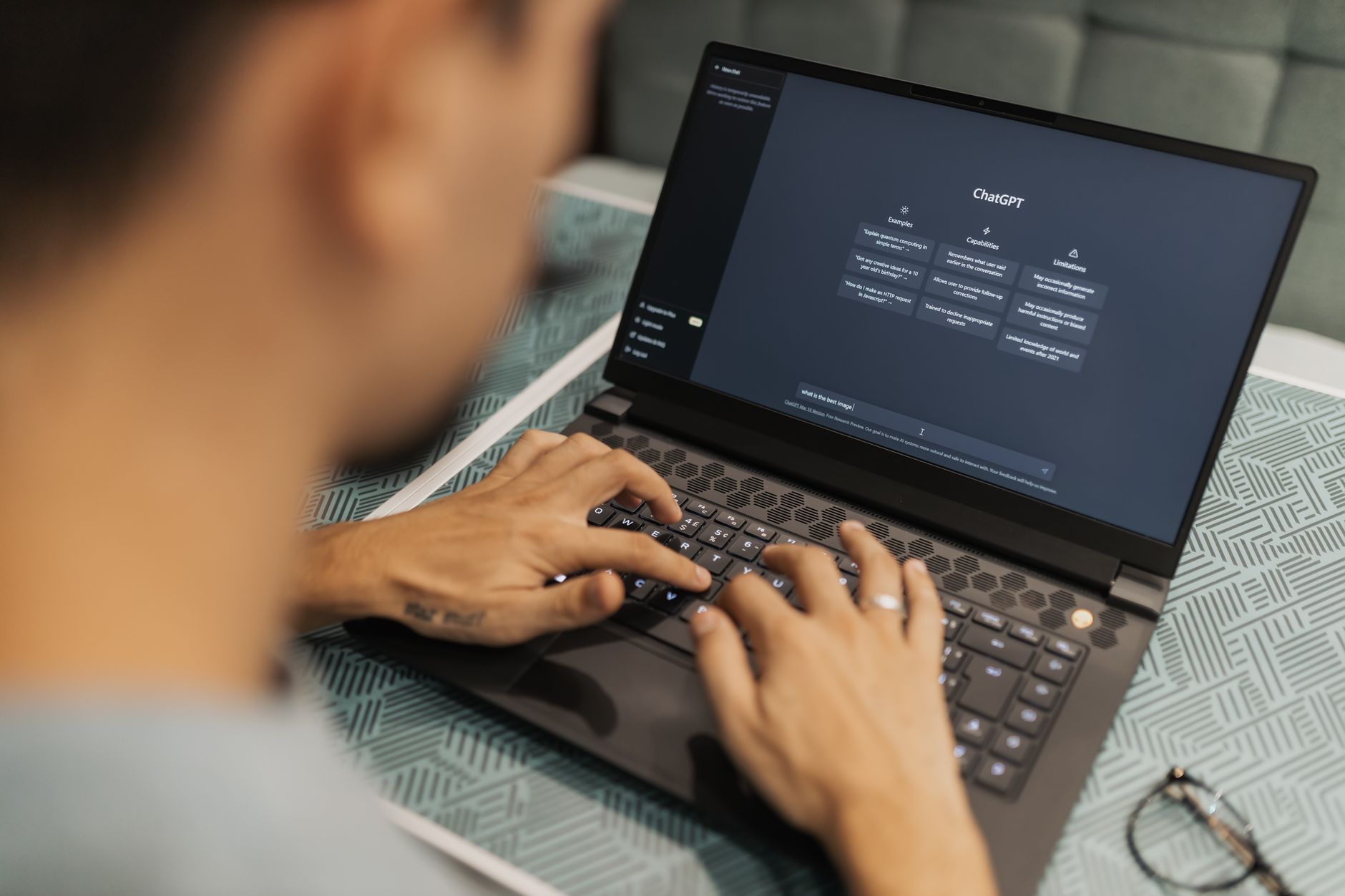Creator working with AI tools while planning YouTube videos