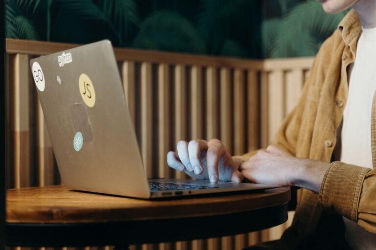 Choosing an AI writing tool on a laptop