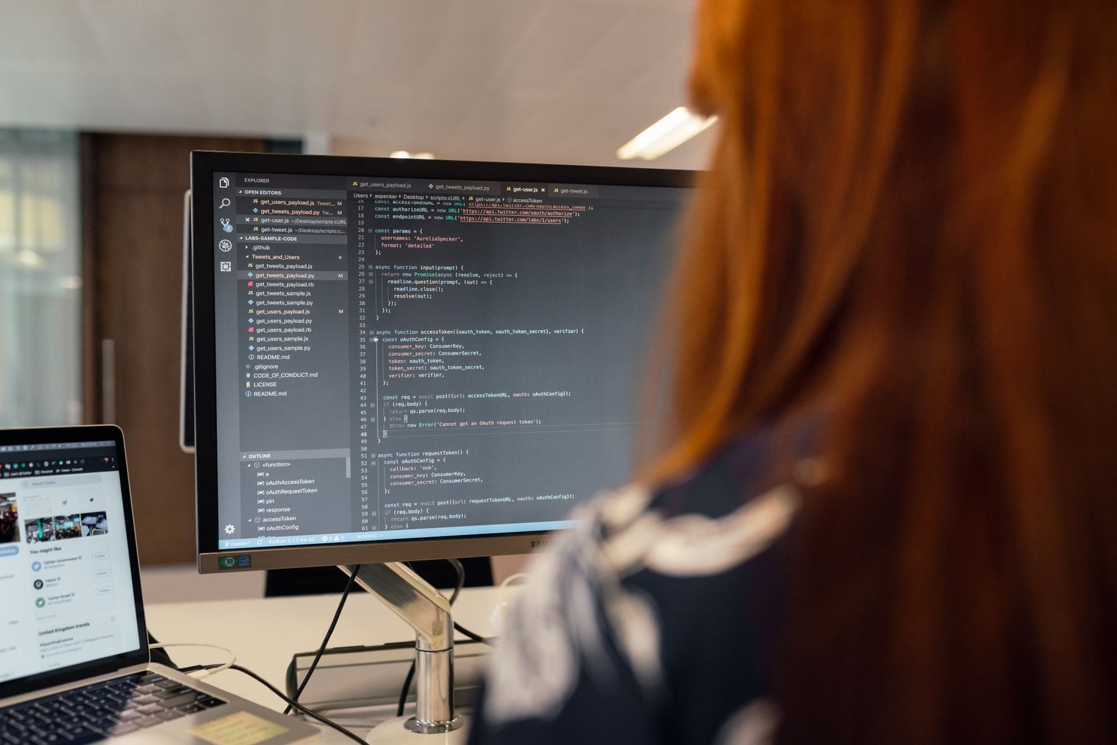 Developer writing and testing application code on a laptop, illustrating a Bolt.new AI app builder workflow