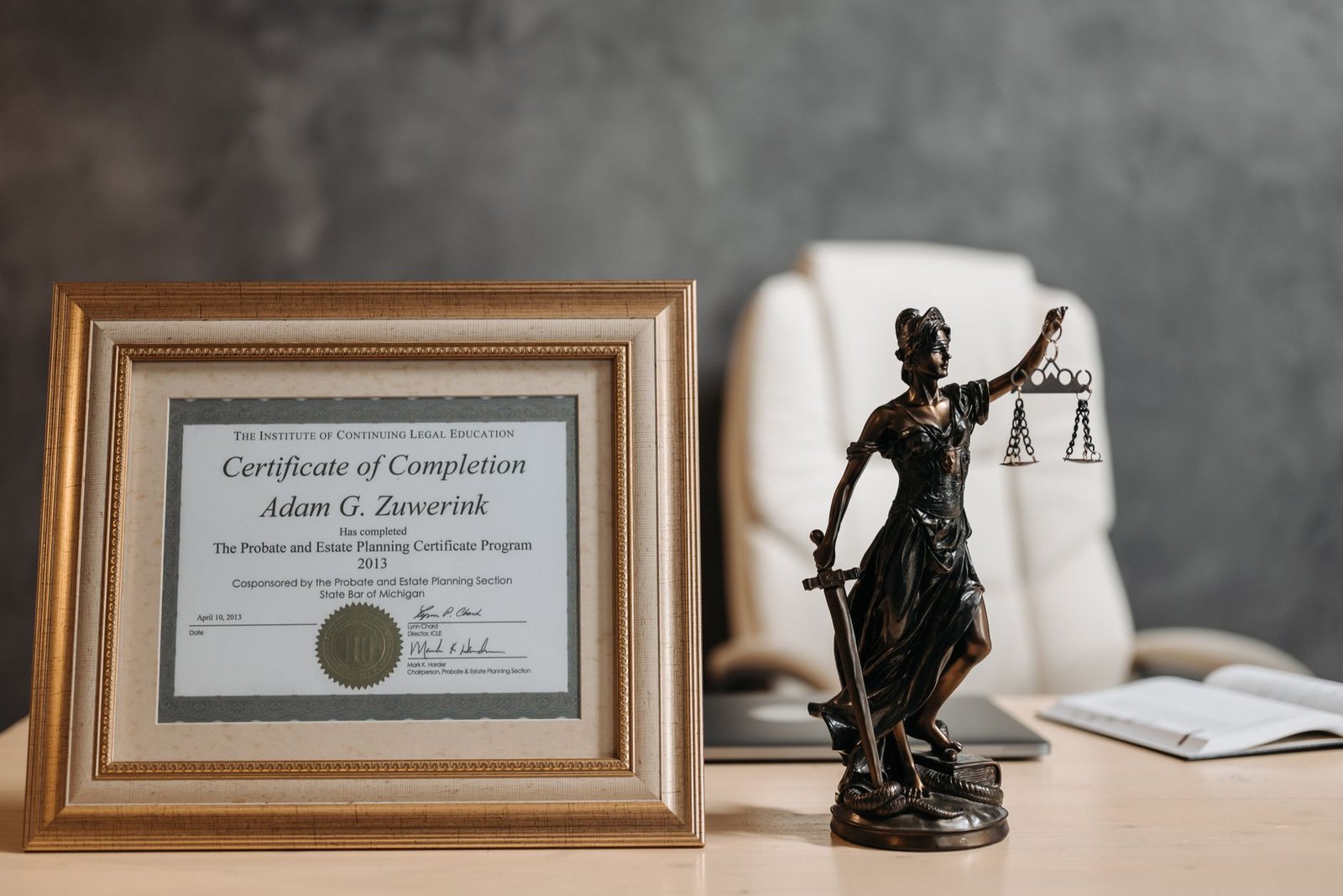 Lawyer working at a law office desk reviewing legal work, illustrating a Harvey AI review for law firms
