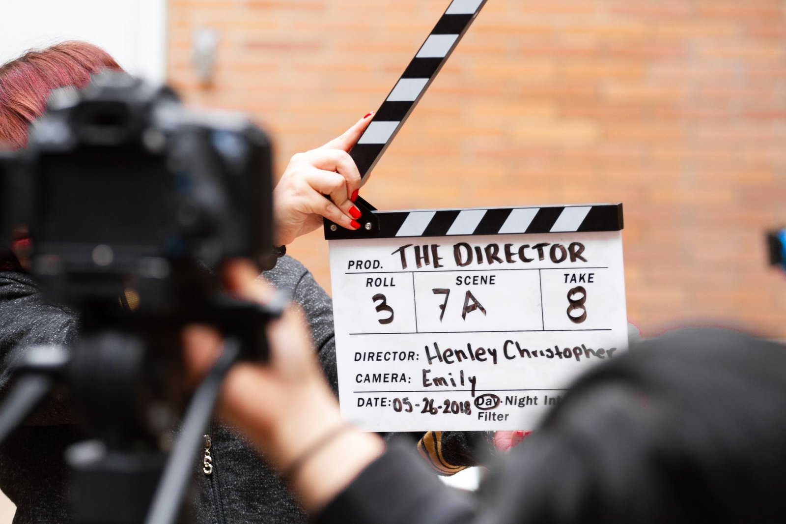 Film clapperboard and camera on a production set, illustrating a Runway Gen-4 AI video review